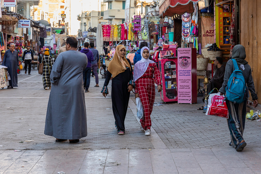 Egyptian women walking in shopping area