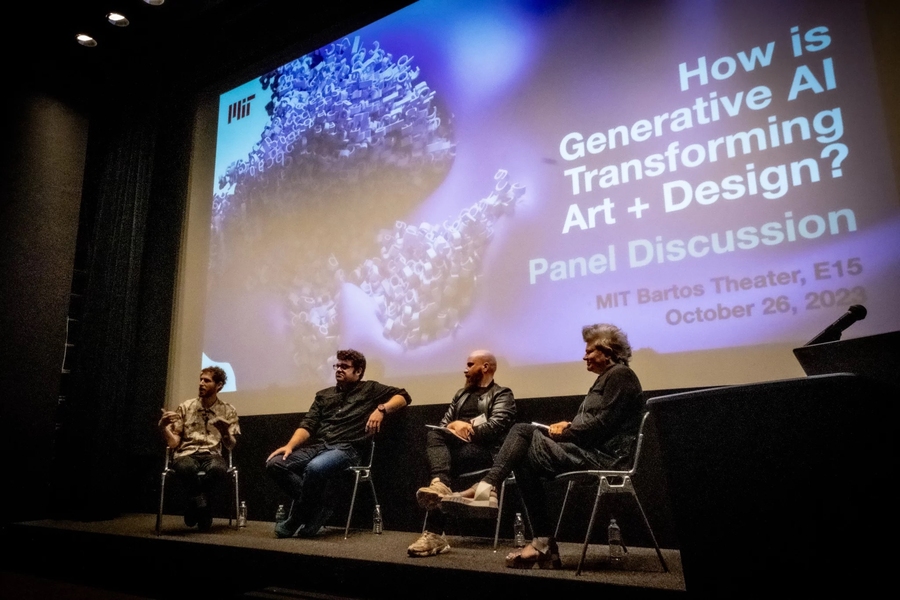Four panelists in a darkened auditorium, sitting in front of a screen showing a purple AI generated work of art