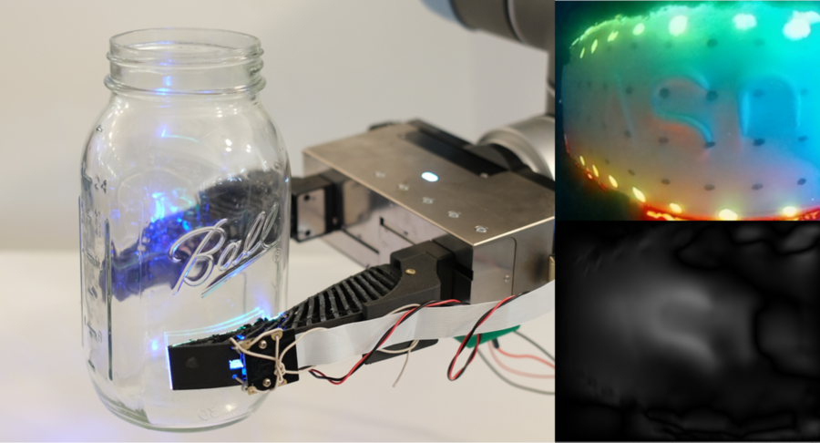 Photo of a robotic gripper holding a Mason jar, with a close-up detail of the tactile sensor