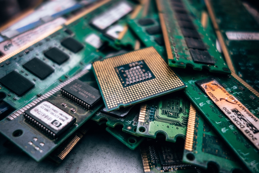 Photo of a pile of computer chips and circuit boards
