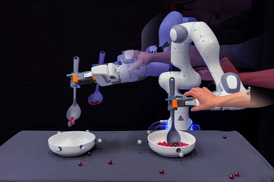 In this collaged image, a robotic hand tries to scoop up red marbles and put them into another bowl while a researcher’s hand frequently disrupts it. The robot eventually succeeds (Credits: Jose-Luis Olivares, MIT. Stills courtesy of the researchers).
