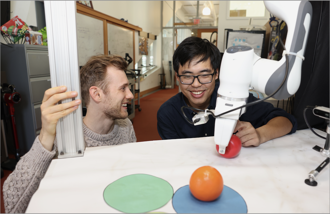 alt="The “Diffusion Forcing” method can sort through noisy data and reliably predict the next steps in a task, helping a robot complete manipulation tasks, for example. In one experiment, it helped a robotic arm rearrange toy fruits into target spots on circular mats despite starting from random positions and visual distractions (Credits: Mike Grimmett/MIT CSAIL)."