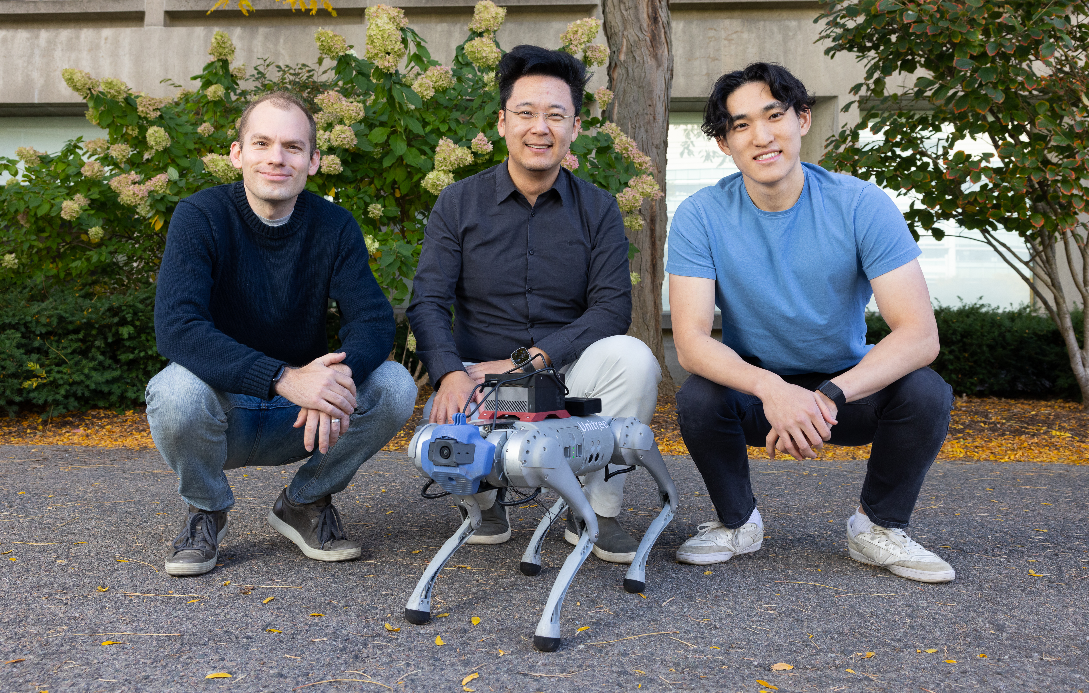 The MIT researchers developed an AI-powered simulator that generates unlimited, diverse, and realistic training data for robots. The team found that robots trained in this virtual environment called “LucidSim” can seamlessly transfer their skills to the real world, performing at expert levels without additional fine-tuning (Credit: Mike Grimmett/MIT CSAIL).