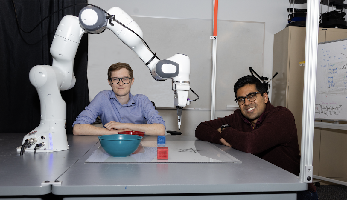 alt="To help robots execute open-ended tasks safely, MIT researchers used vision models to see what’s near the machine and model its constraints. Their “PRoC3S” strategy has an LLM sketch up an action plan that’s checked in a simulator to ensure it’ll work in the real world (Credit: Mike Grimmett/MIT CSAIL)."